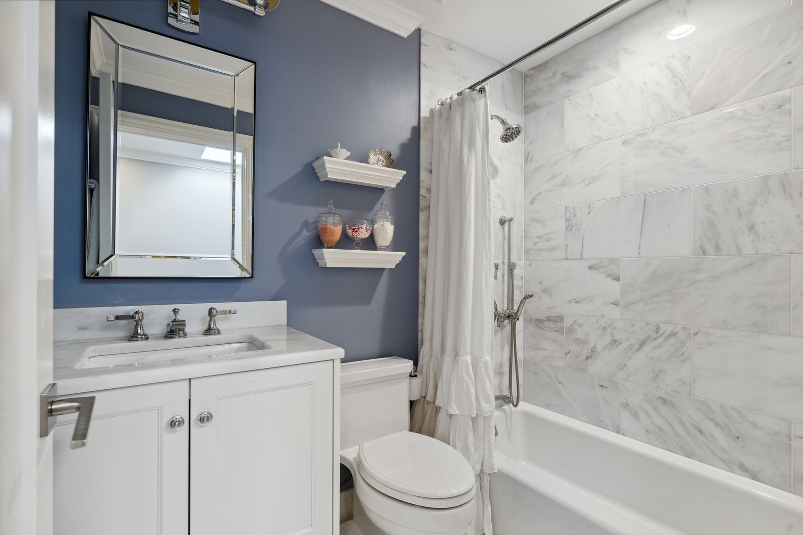 641 West Willow Street, Unit 105 Chicago, IL 60614 - Photo 28 of 37 a bathroom with a sink toilet and shower