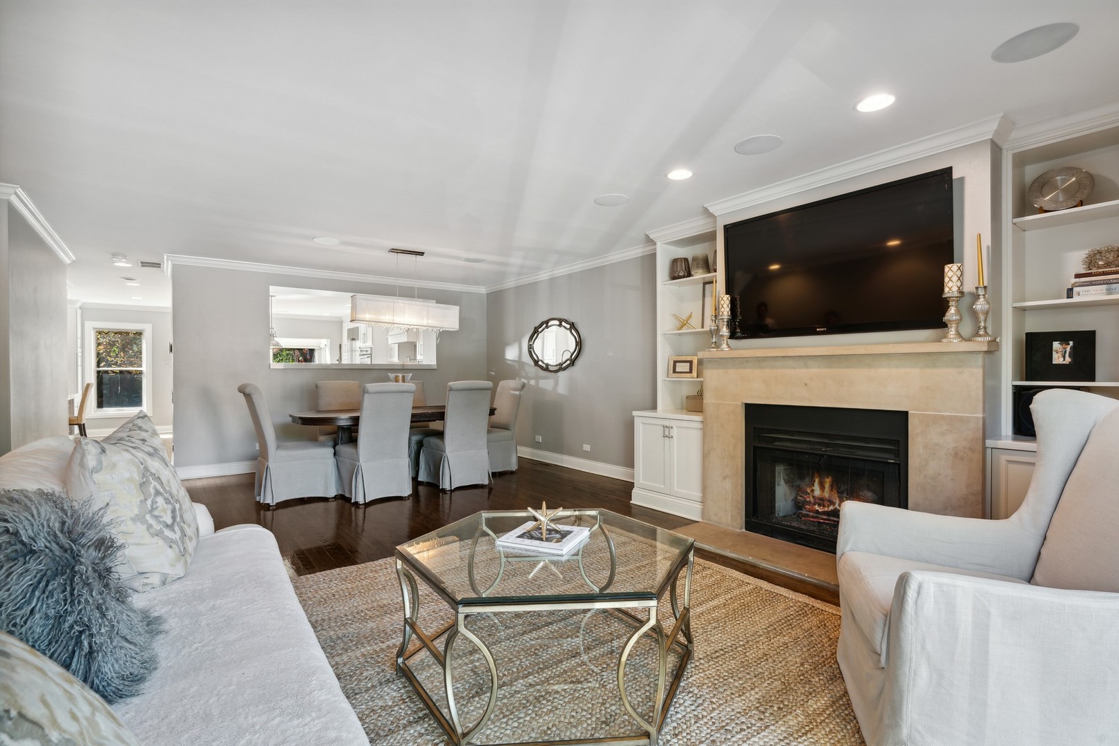 641 West Willow Street, Unit 105 Chicago, IL 60614 - Photo 5 of 37 a living room with furniture and a fireplace