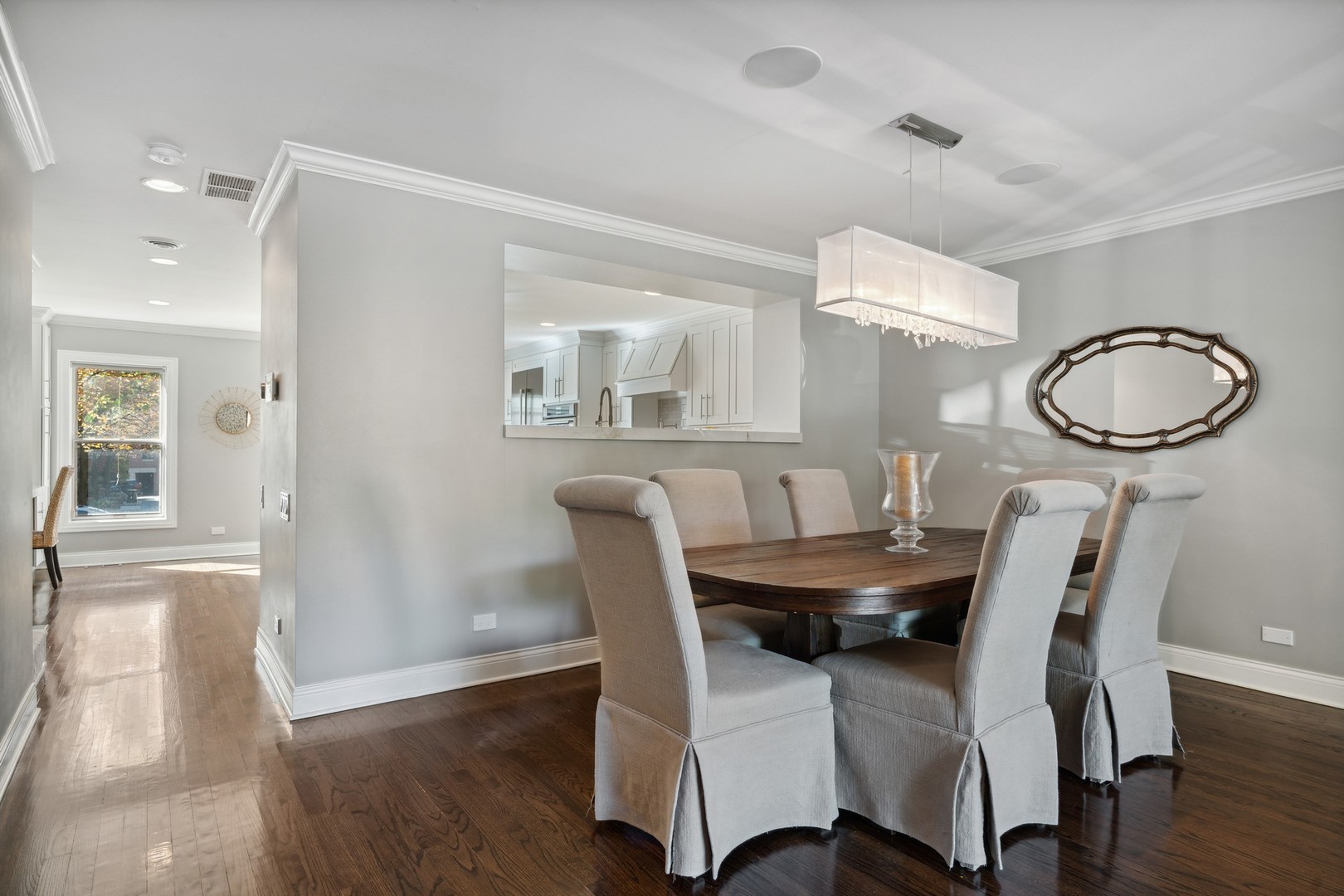 641 West Willow Street, Unit 105 Chicago, IL 60614 - Photo 7 of 37 a view of a dining room with furniture and wooden floor