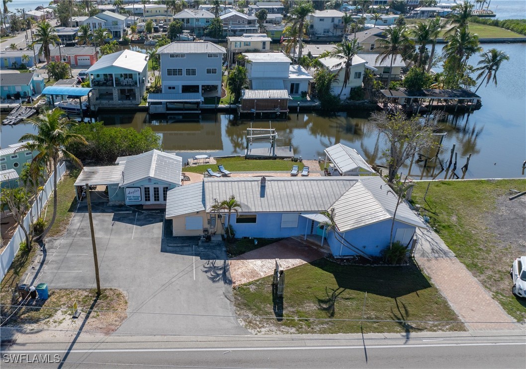 a view of house and outdoor space with swimming pool