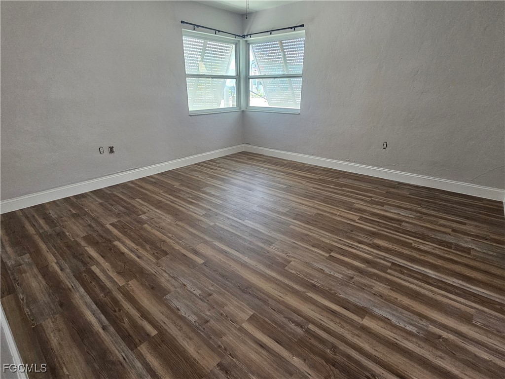 4673 Pine Island Road Matlacha, FL 33993 - Photo 16 of 29 wooden floor in an empty room