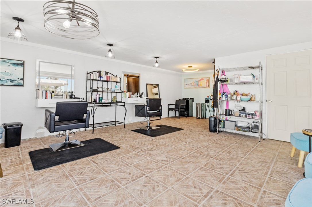 4673 Pine Island Road Matlacha, FL 33993 - Photo 20 of 29 a view of a livingroom with workspace and a couch