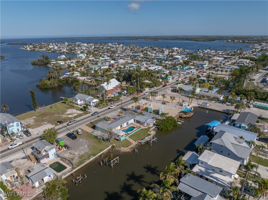 4673 Pine Island Road Matlacha, FL 33993 - Photo 25 of 29 an aerial view of a city with ocean view