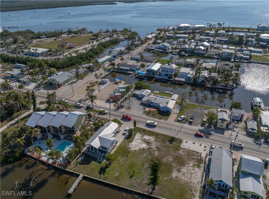 4673 Pine Island Road Matlacha, FL 33993 - Photo 26 of 29 an aerial view of residential houses with outdoor space
