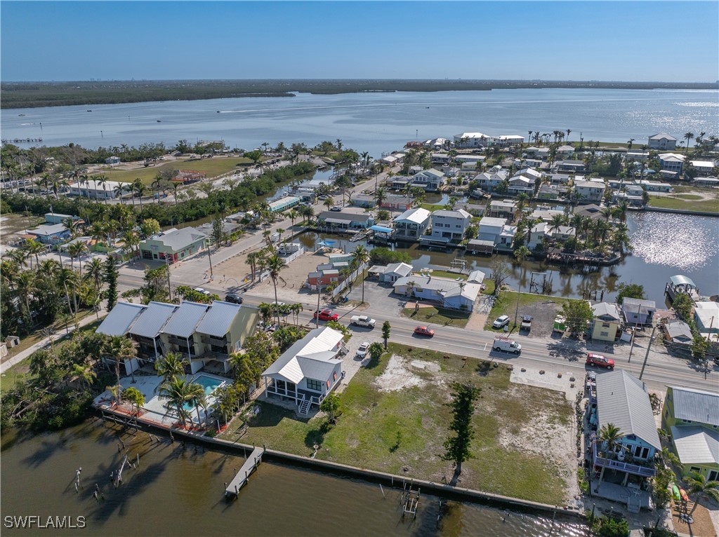 4673 Pine Island Road Matlacha, FL 33993 - Photo 27 of 29 an aerial view of residential houses with outdoor space