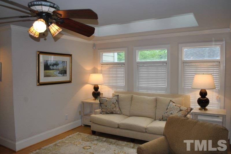 1512 Fairview Road Raleigh, NC 27608 - Photo 22 of 25 a living room with furniture and a window
