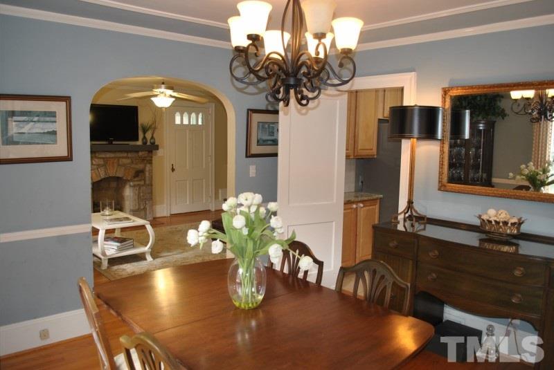 1512 Fairview Road Raleigh, NC 27608 - Photo 8 of 25 a dining room with furniture and chandelier