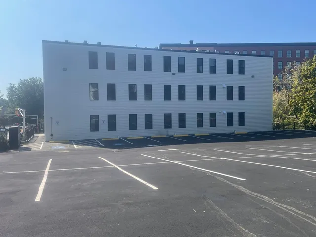 a view of building with a street