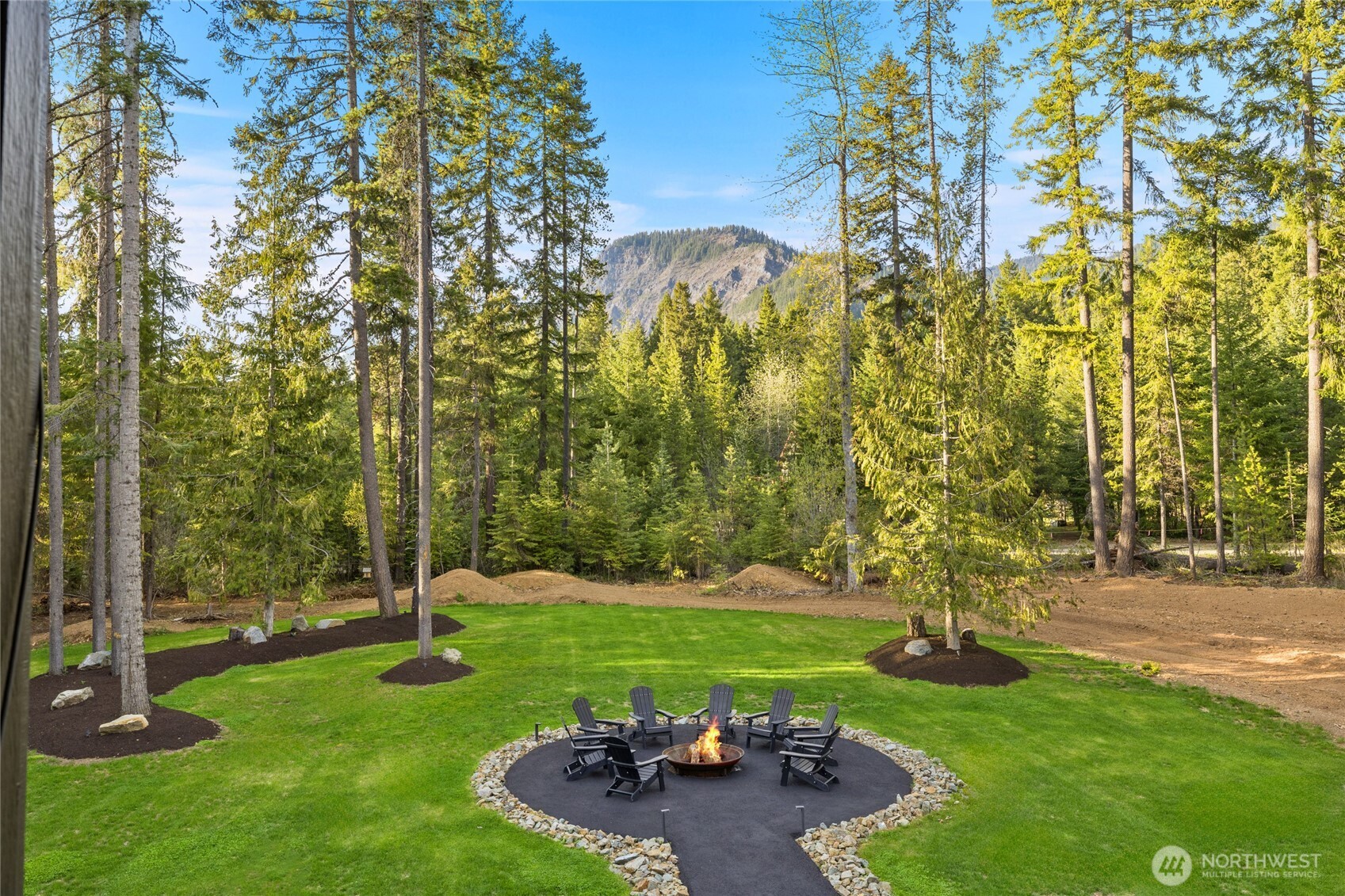 630 Silver Creek Road Easton, WA 98925 - Photo 3 of 40 a view of a garden with a bench
