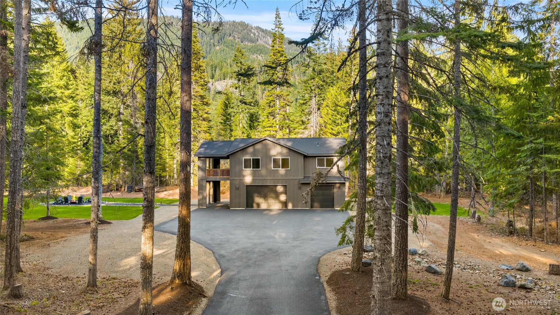630 Silver Creek Road Easton, WA 98925 - Photo 31 of 40 a view of a house with a yard