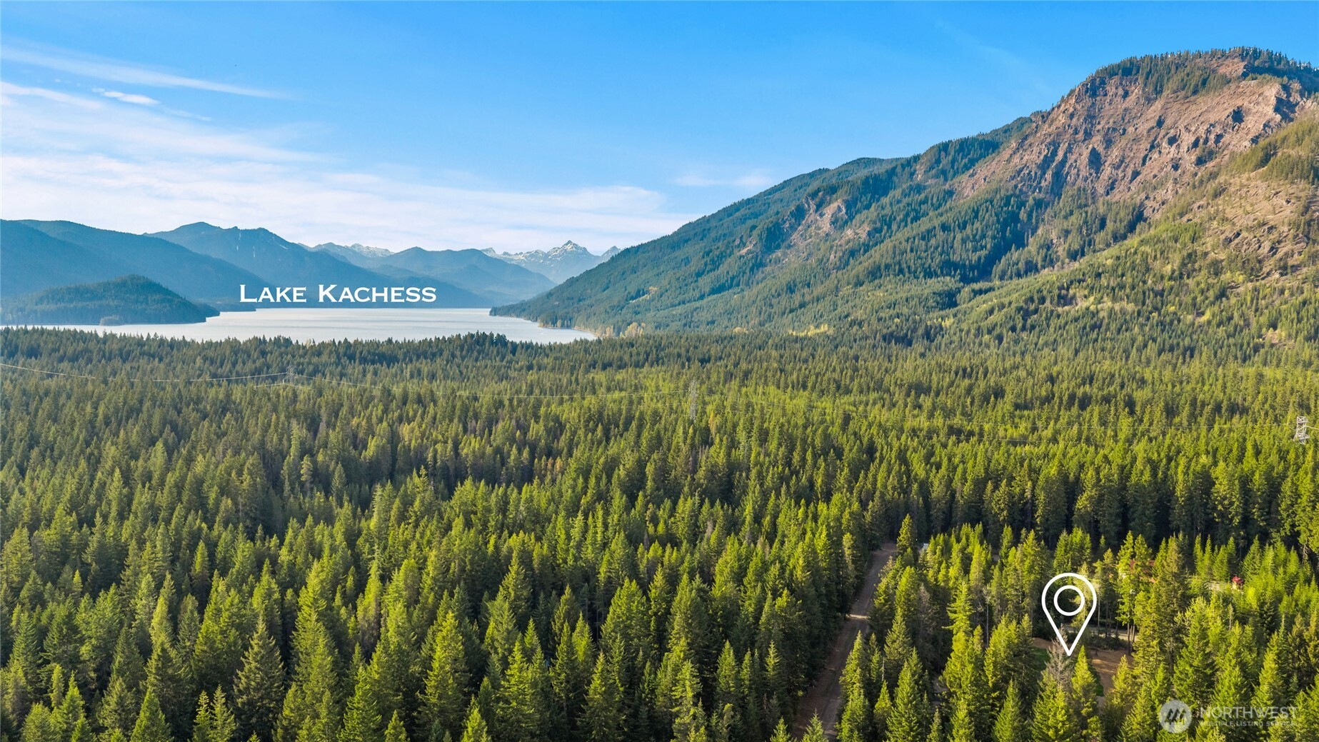 630 Silver Creek Road Easton, WA 98925 - Photo 35 of 40 a view of a lake with a mountain in the back