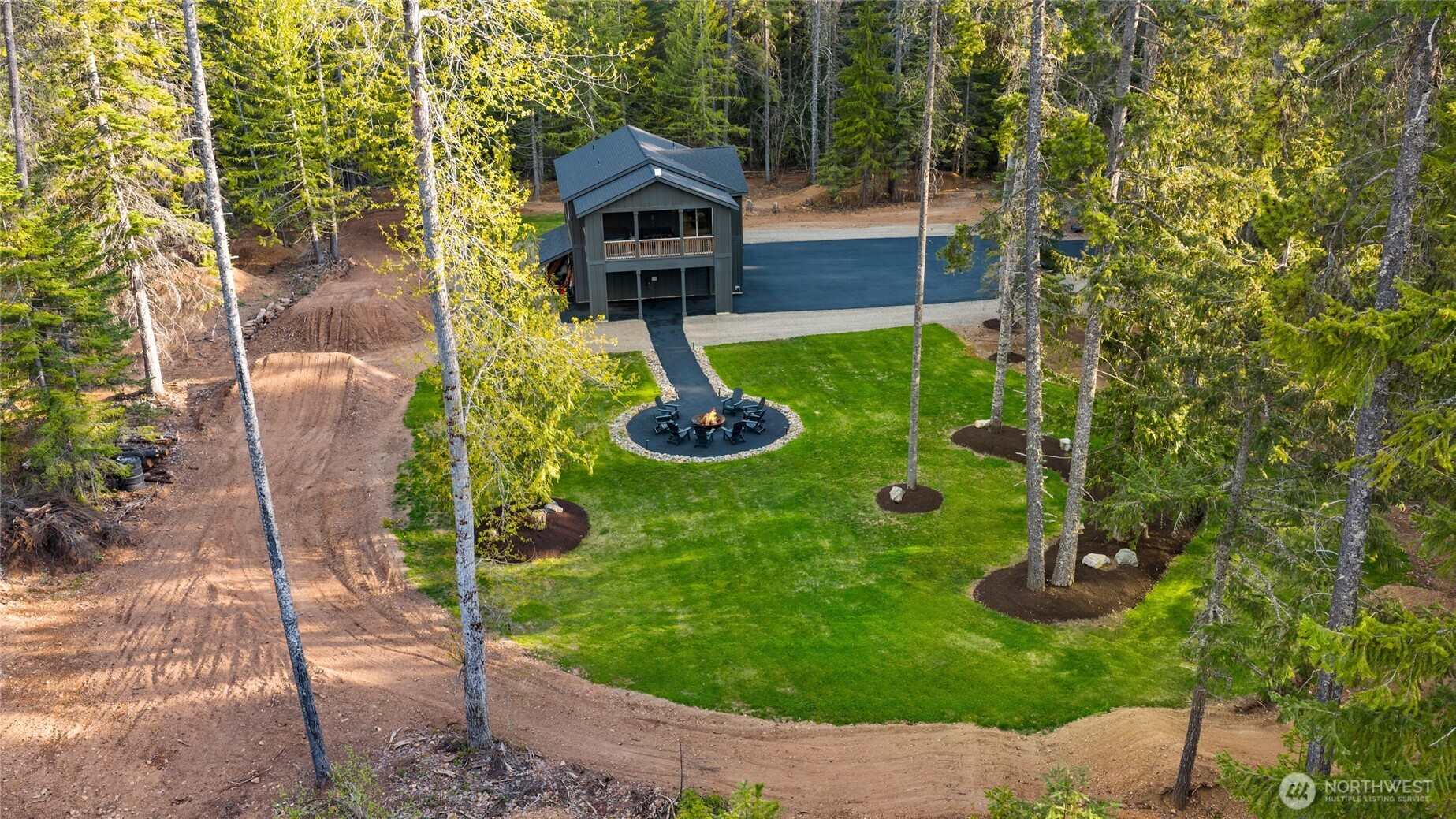 630 Silver Creek Road Easton, WA 98925 - Photo 36 of 40 a house view with a garden space