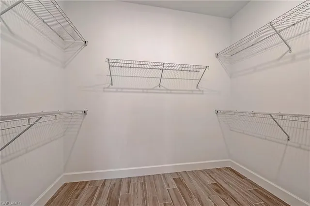 a view of a room with racks on the wall