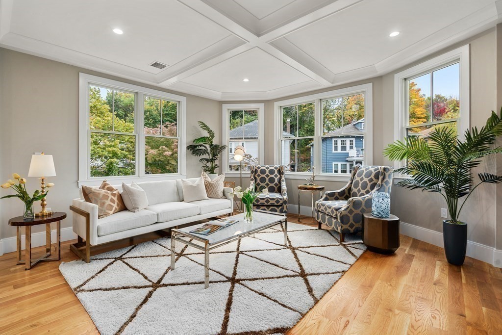 96 Verndale Street, Unit 2 Brookline, MA 02446 - Photo 12 of 31 a living room with furniture and a large window