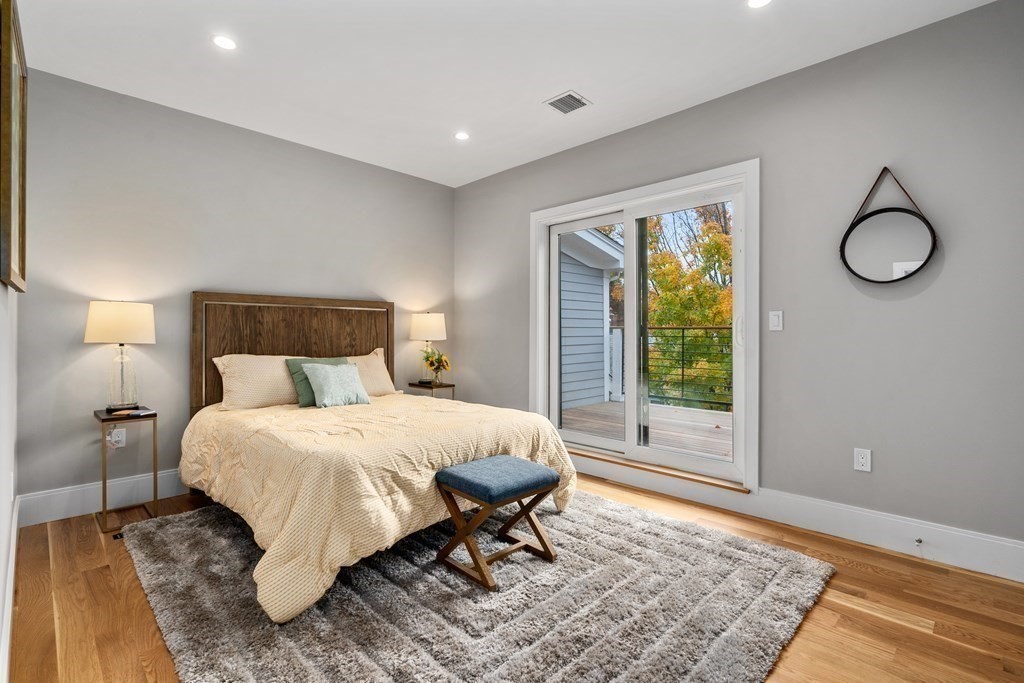 96 Verndale Street, Unit 2 Brookline, MA 02446 - Photo 20 of 31 a bedroom with a bed and window