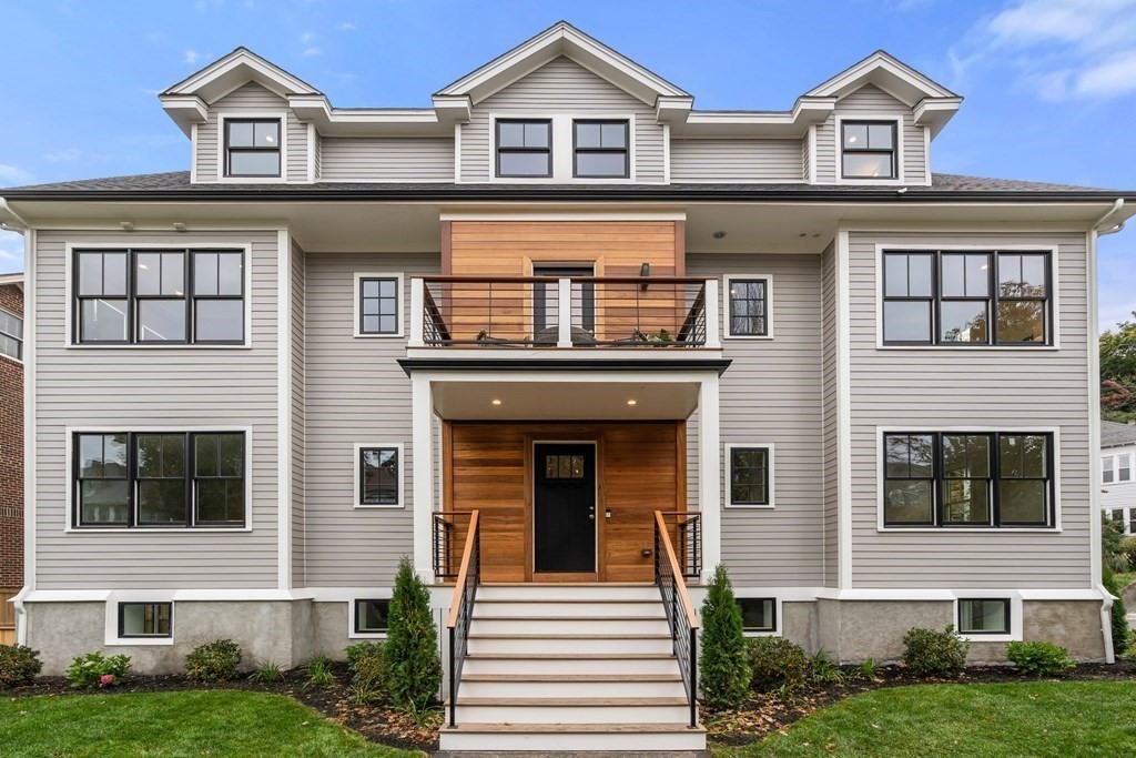 96 Verndale Street, Unit 2 Brookline, MA 02446 - Photo 2 of 31 front view of a house with a yard
