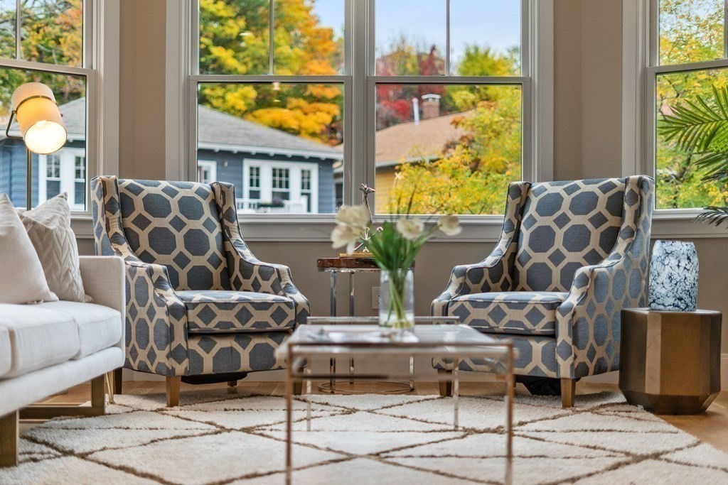 96 Verndale Street, Unit 2 Brookline, MA 02446 - Photo 23 of 31 a living room with fireplace furniture and a floor to ceiling window
