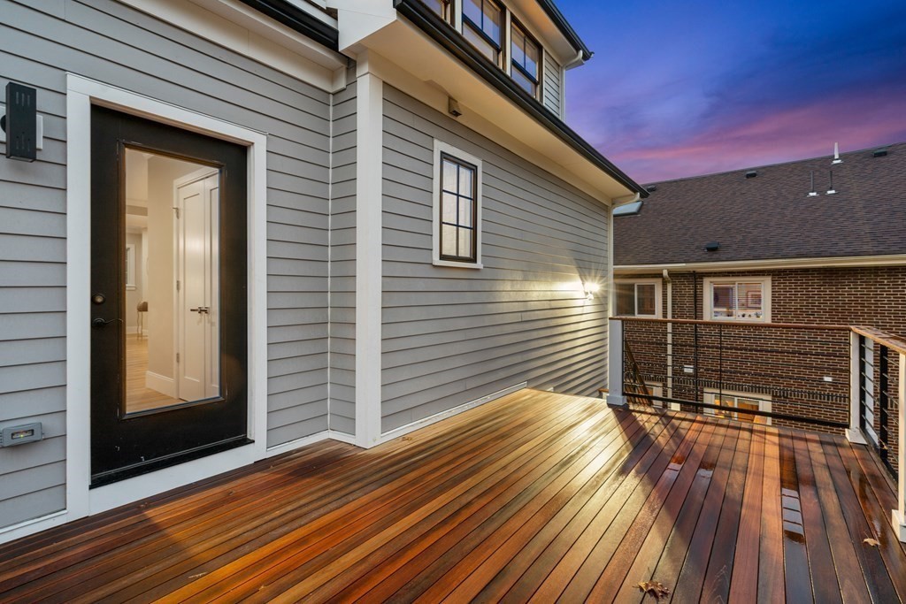 96 Verndale Street, Unit 2 Brookline, MA 02446 - Photo 28 of 31 a view of backyard with a deck