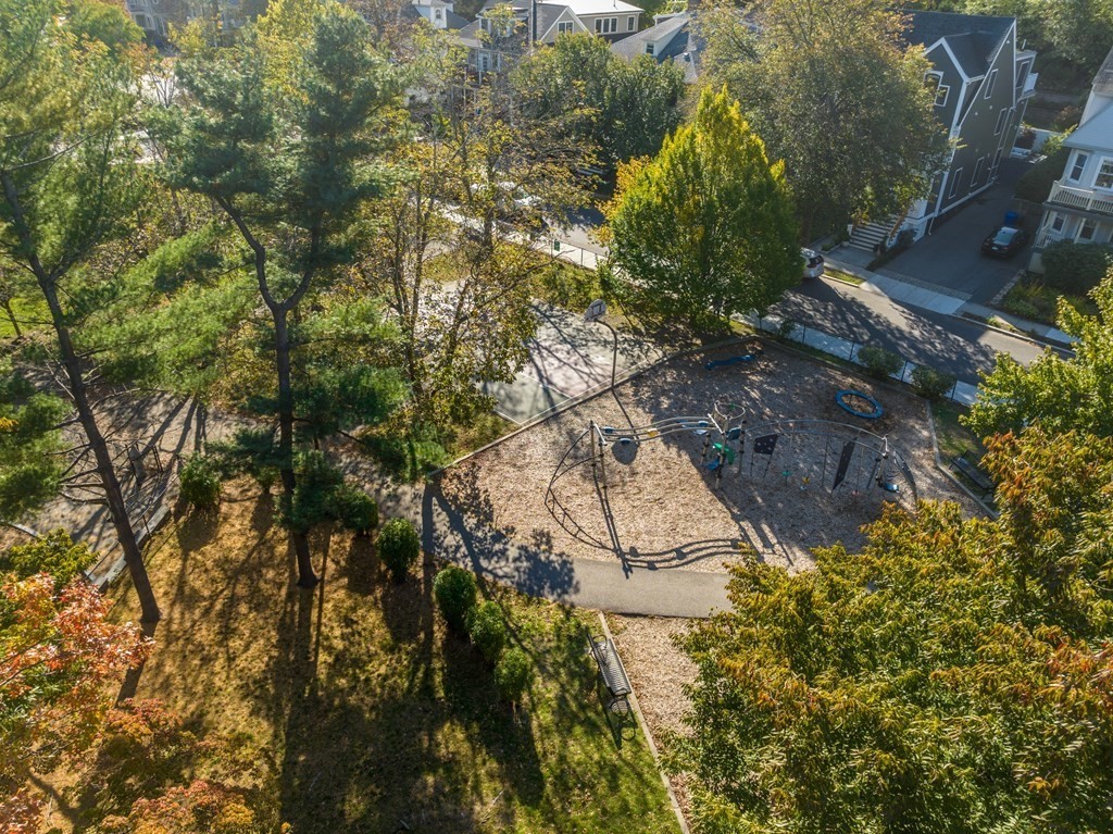 96 Verndale Street, Unit 2 Brookline, MA 02446 - Photo 30 of 31 a backyard of a house with lots of green space