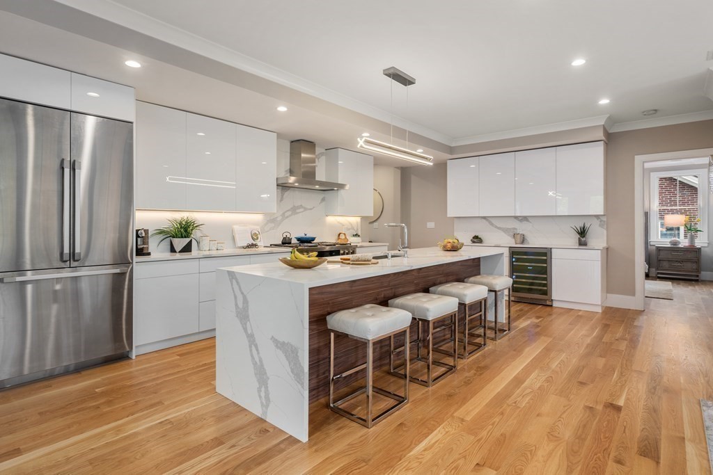 96 Verndale Street, Unit 2 Brookline, MA 02446 - Photo 7 of 31 a kitchen with a sink appliances and cabinets