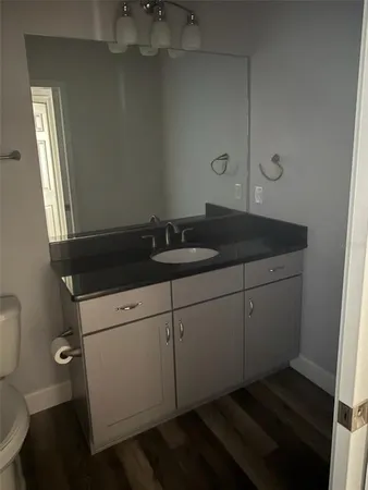 a utility room with cabinets