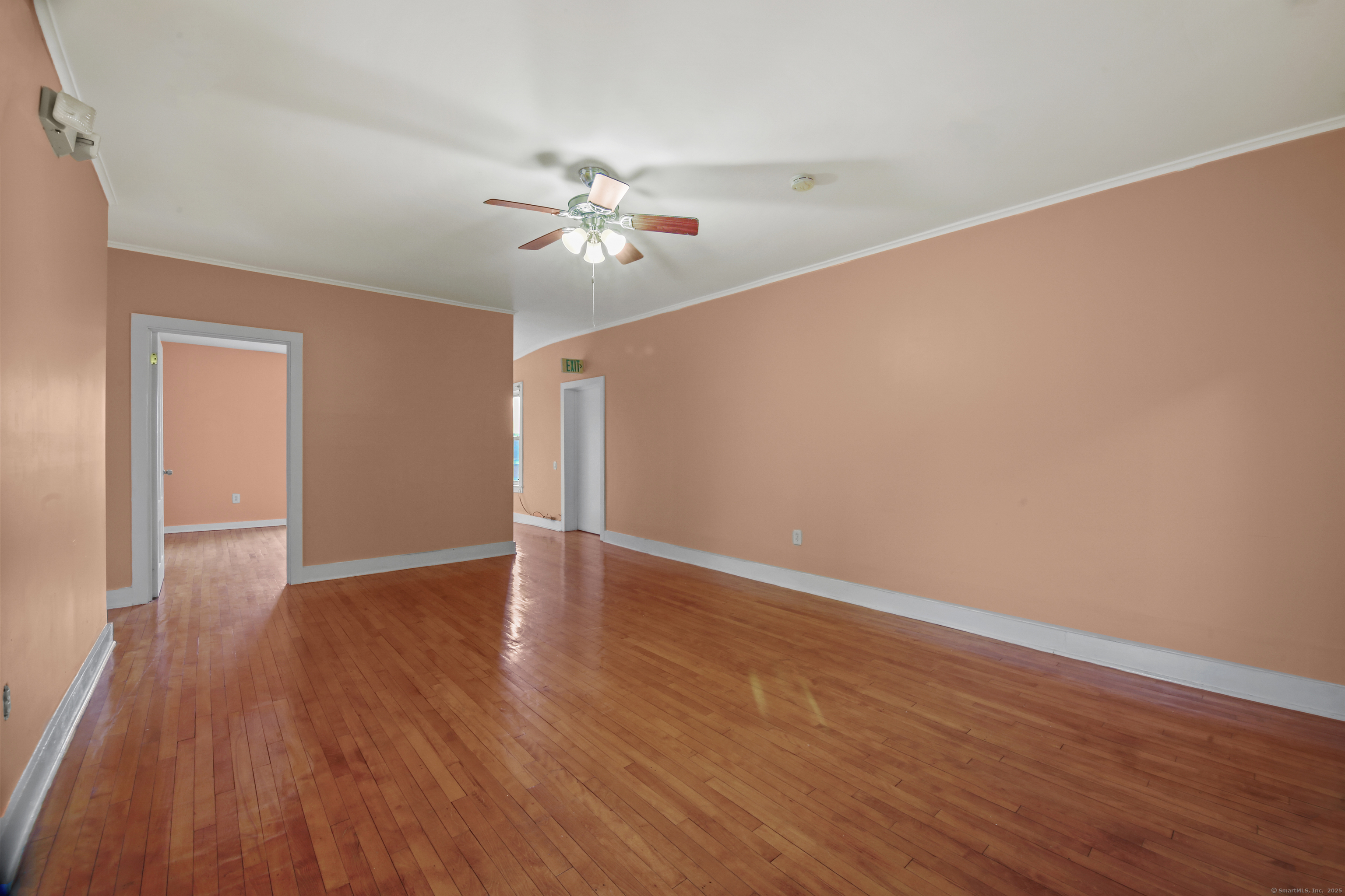 360 Main Street, Unit 3B Middletown, CT 06457 - Photo 19 of 24 a view of empty room with wooden floor