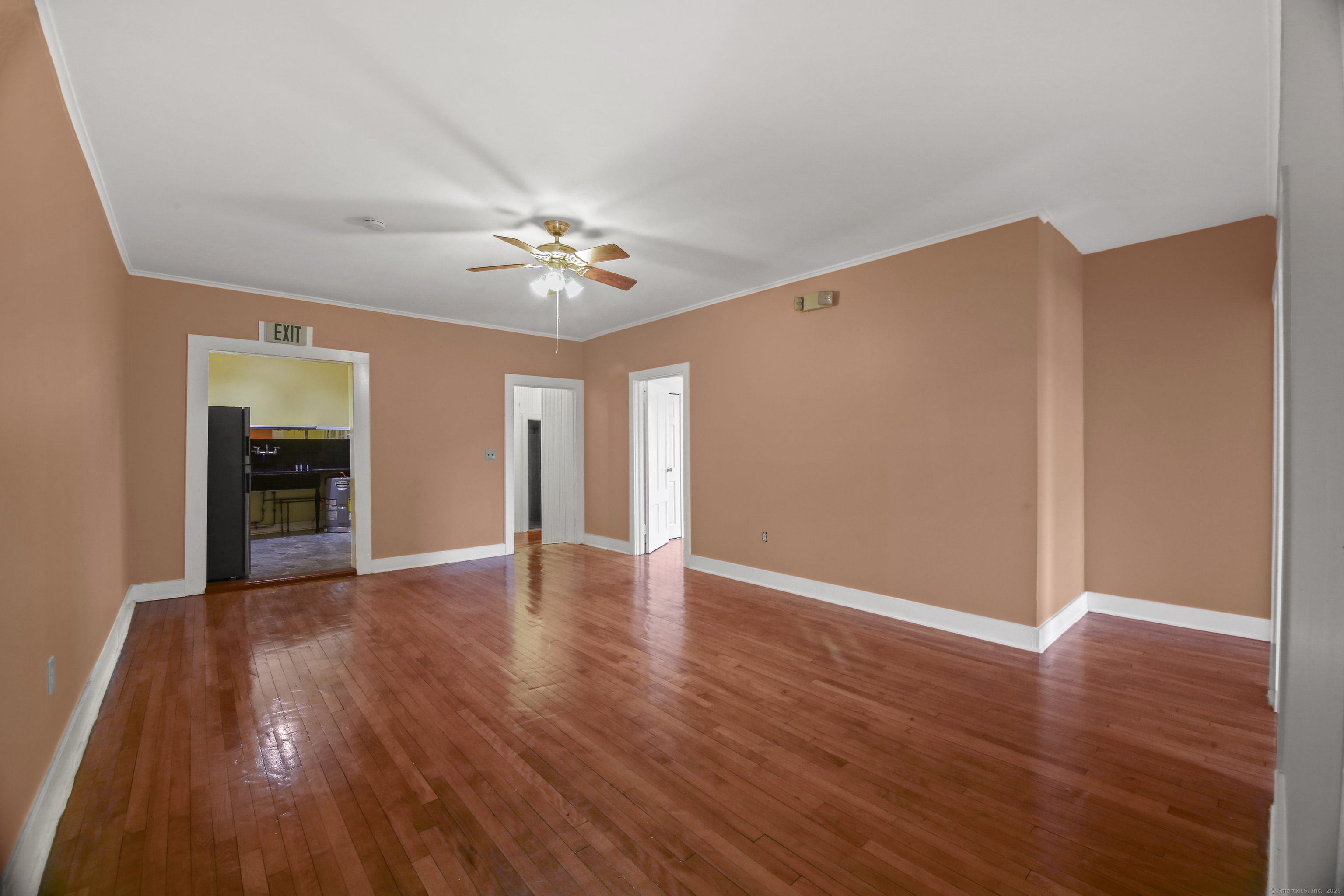 360 Main Street, Unit 3B Middletown, CT 06457 - Photo 20 of 24 a view of an empty room with wooden floor