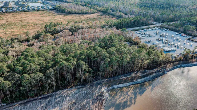 a view of a wooden house with a yard