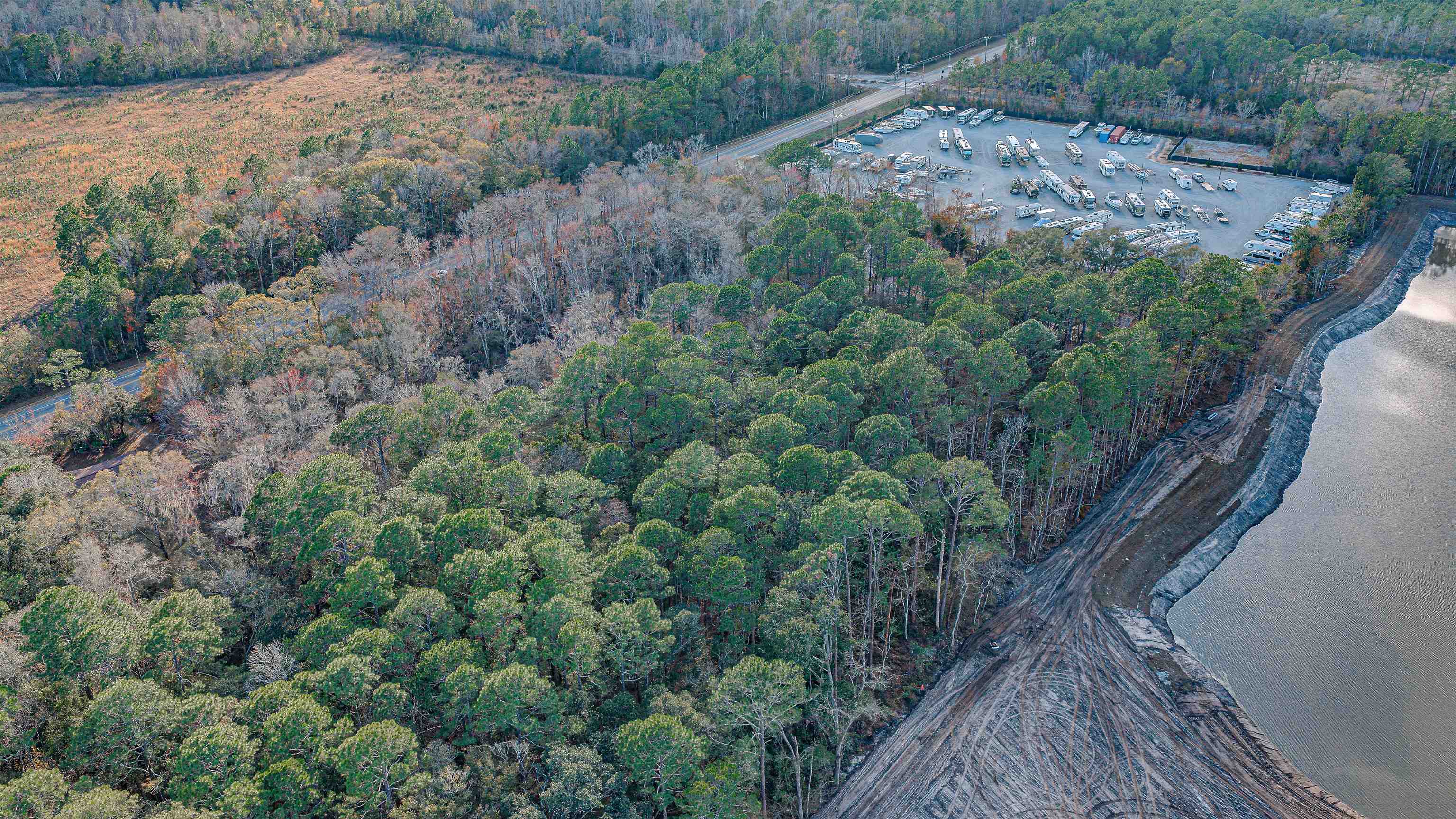 0 State Road 206 St. Augustine, FL 32086 - Photo 17 of 27 a view of a wooden house with a yard