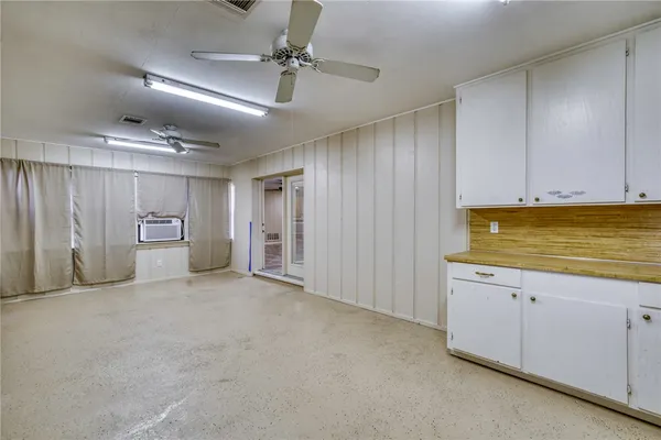 a view of an empty room and window