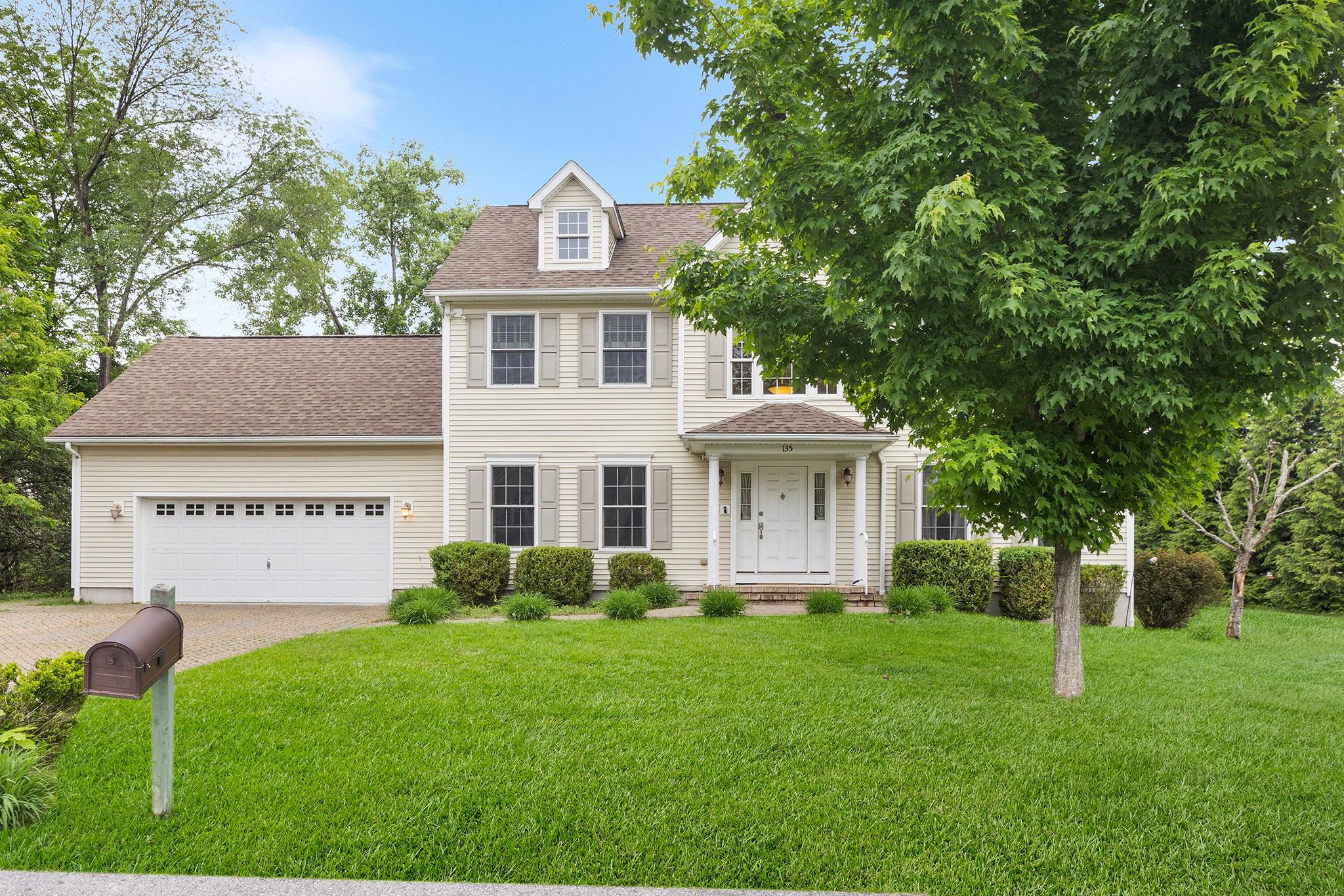 a view of a house with a garden