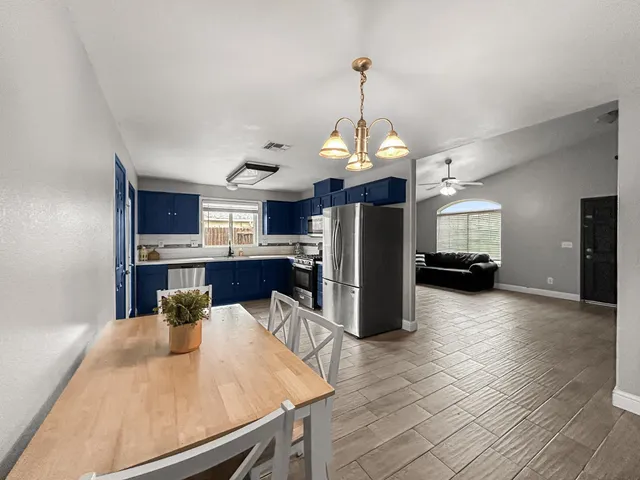 a view of a kitchen and a chandelier