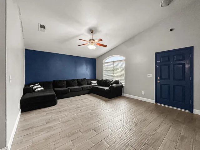 a living room with furniture