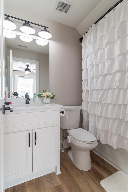 2250 Sperin Road Ball Ground, GA 30107 - Photo 44 of 56 a bathroom with a toilet a sink and a mirror