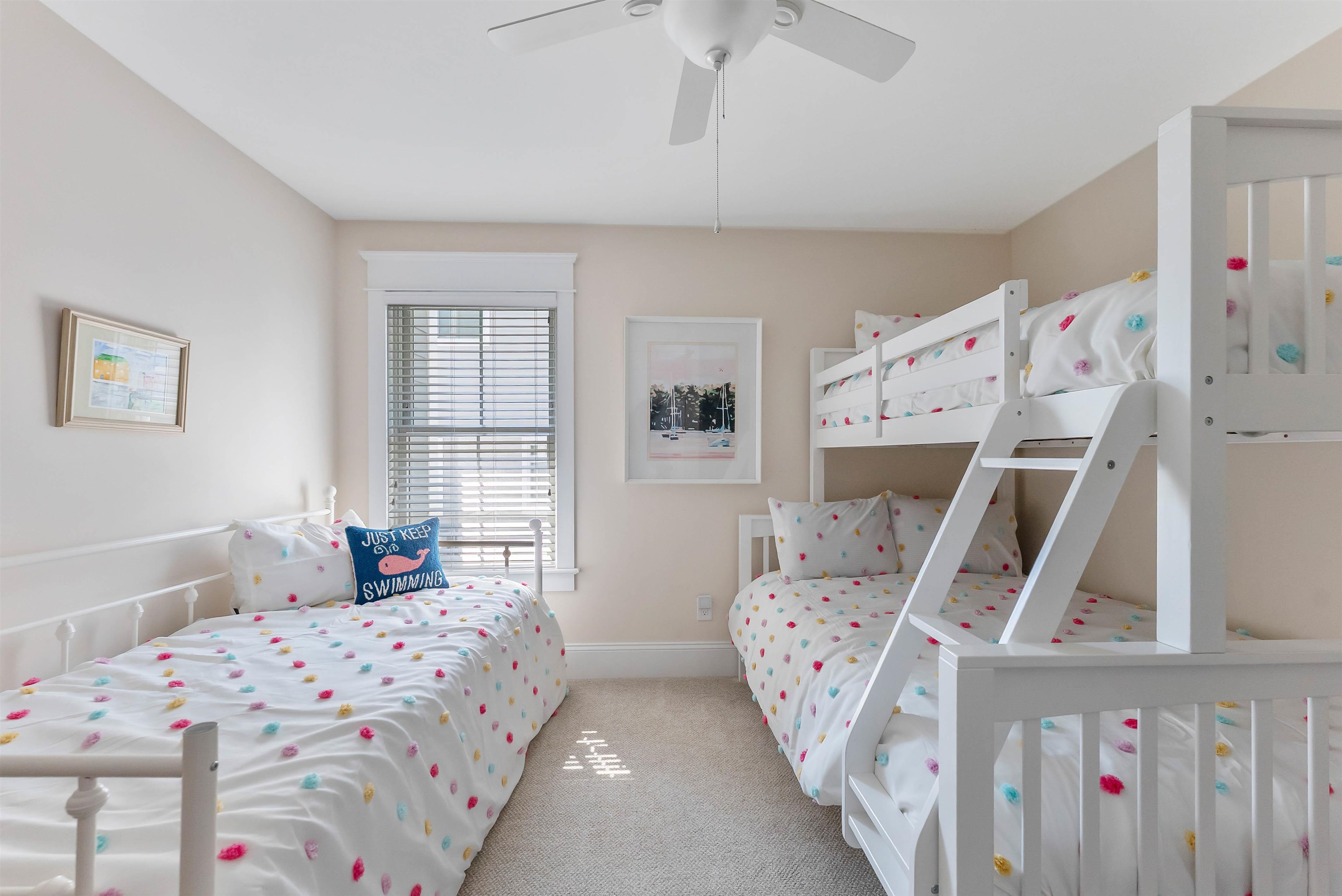 149 10th Street Avalon, NJ 08202 - Photo 12 of 49 a bedroom with furniture and a baby crib
