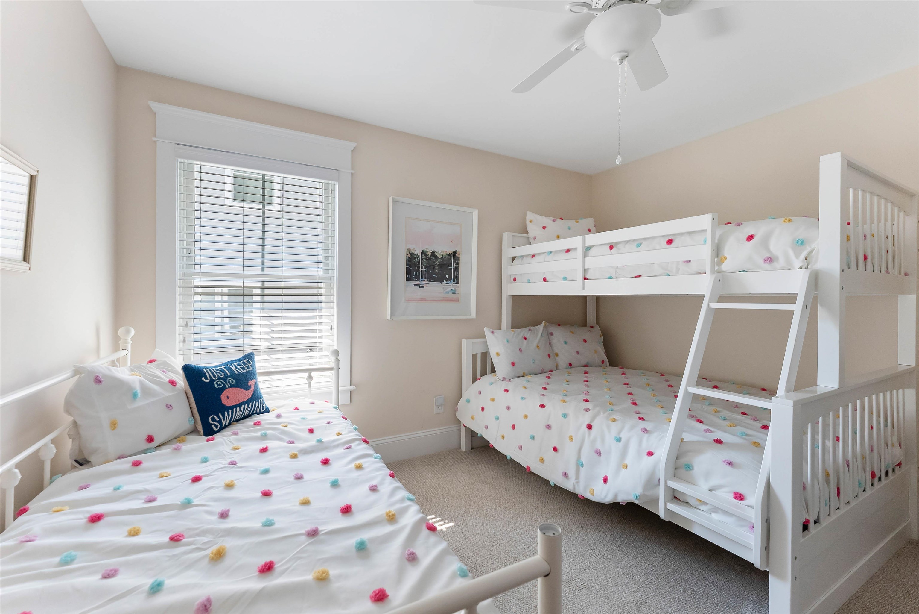 149 10th Street Avalon, NJ 08202 - Photo 13 of 49 a bedroom with two beds and a window