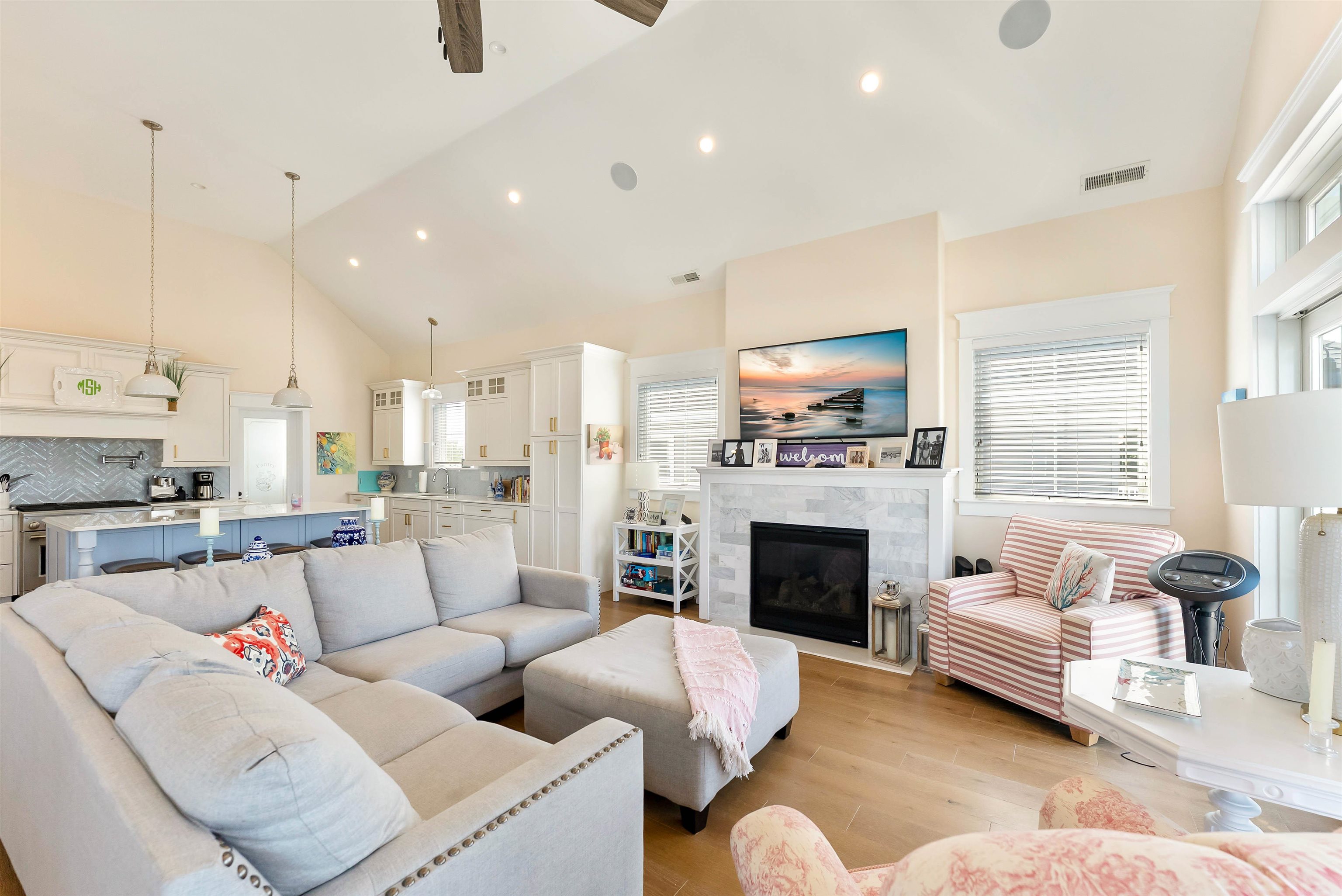 149 10th Street Avalon, NJ 08202 - Photo 22 of 49 a living room with furniture fireplace and a large window