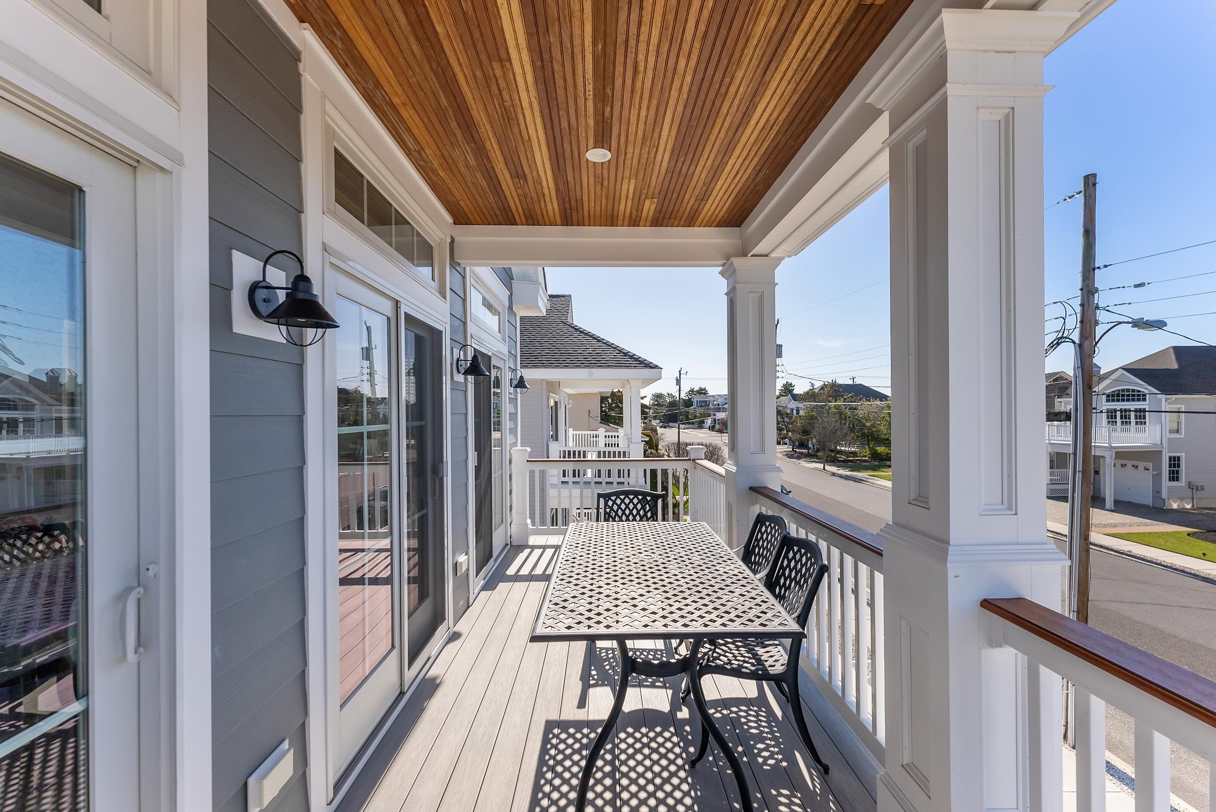 149 10th Street Avalon, NJ 08202 - Photo 23 of 49 a view of a balcony and chairs