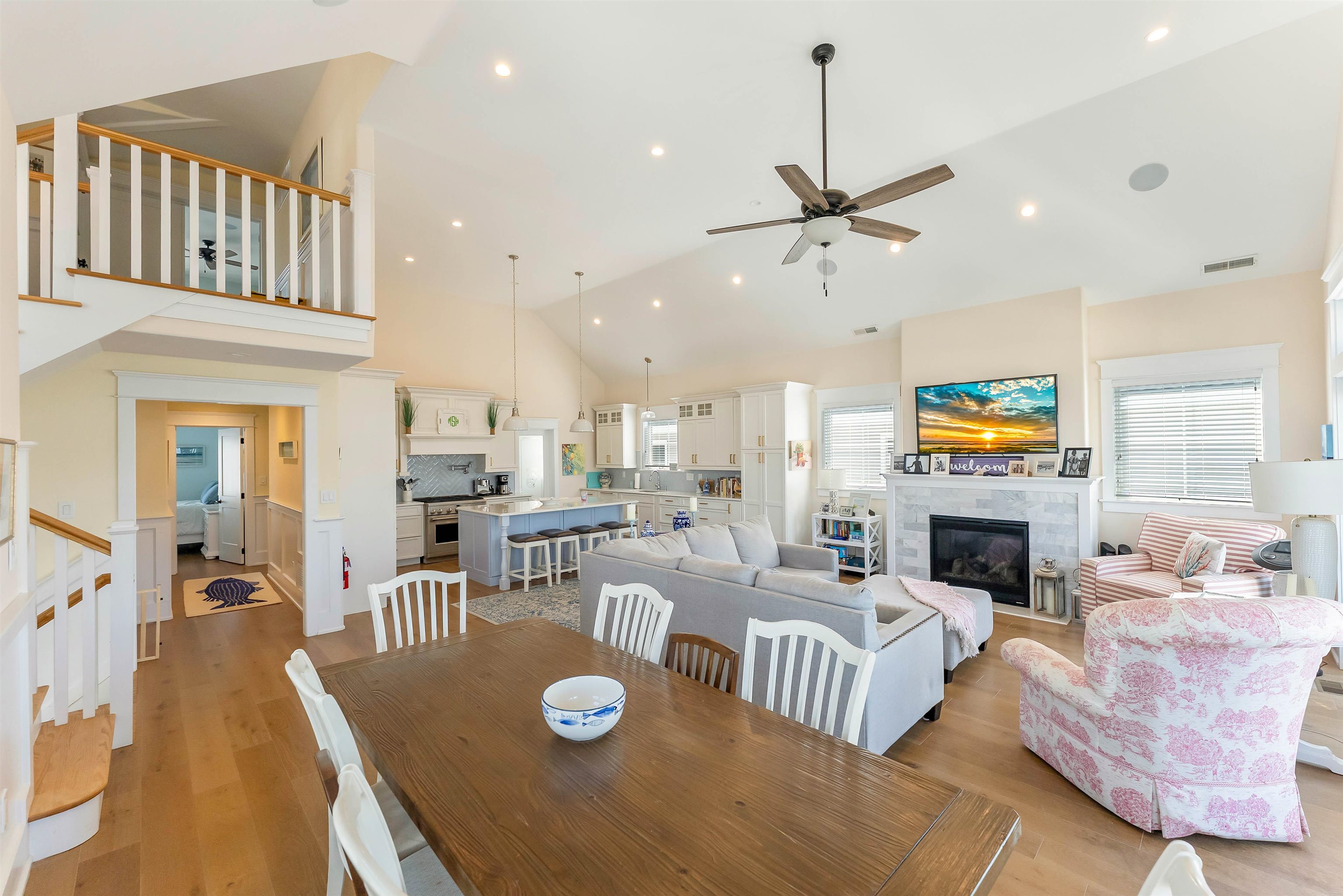 149 10th Street Avalon, NJ 08202 - Photo 29 of 49 a living room with furniture fireplace and dining table