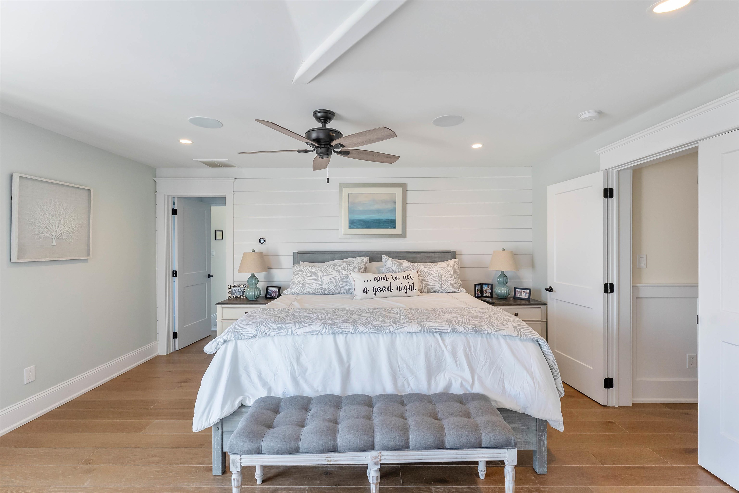 149 10th Street Avalon, NJ 08202 - Photo 39 of 49 a bedroom with a bed and a mirror