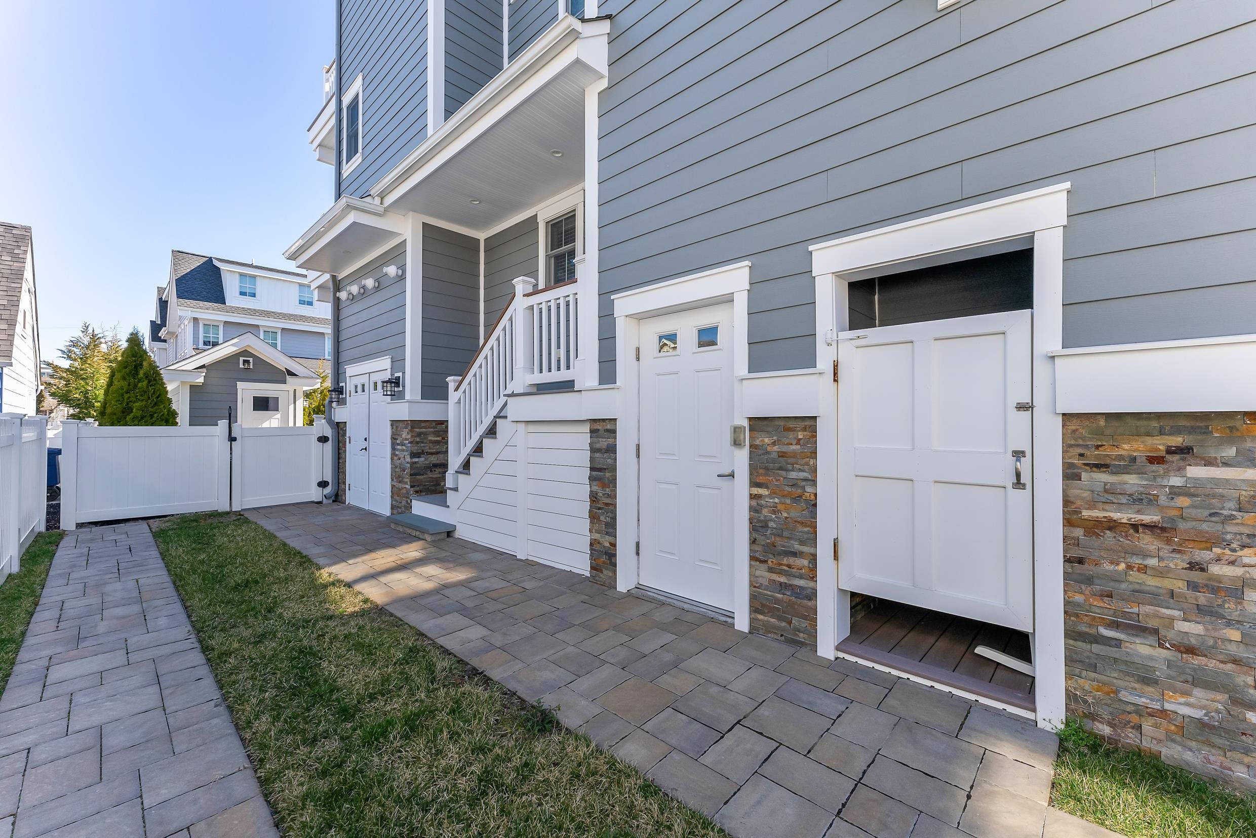 149 10th Street Avalon, NJ 08202 - Photo 49 of 49 a view of a house with a door