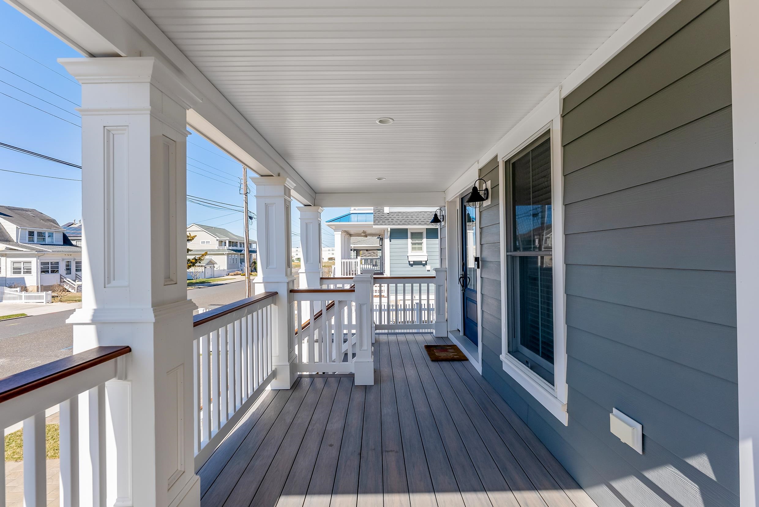 149 10th Street Avalon, NJ 08202 - Photo 5 of 49 a view of a porch with wooden floor