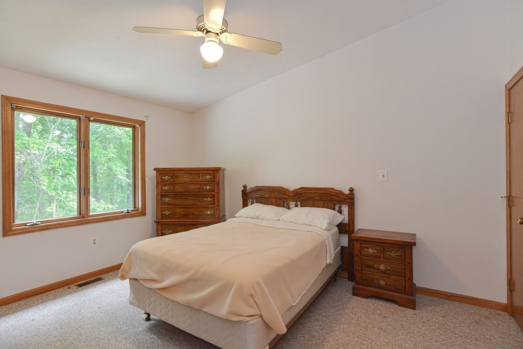 17 Nottingham Road, Unit 17 Grafton, MA 01519 - Photo 13 of 23 a bedroom with a bed and a window