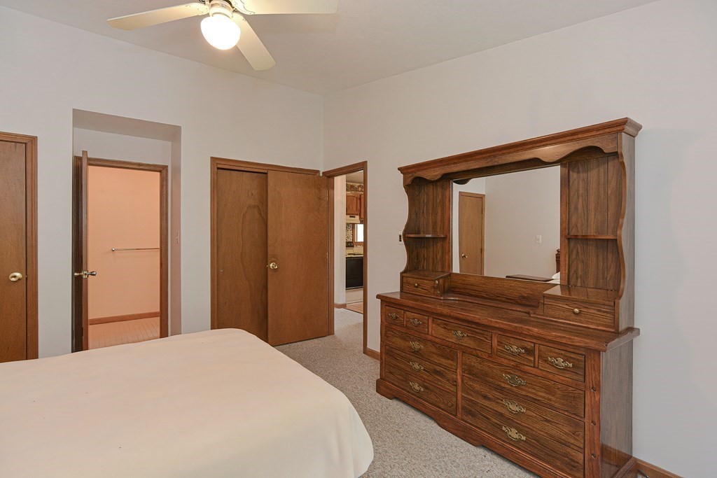 17 Nottingham Road, Unit 17 Grafton, MA 01519 - Photo 14 of 23 a bedroom with a bed and a dresser