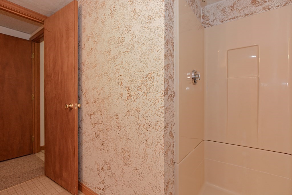 17 Nottingham Road, Unit 17 Grafton, MA 01519 - Photo 16 of 23 a bathroom with a shower