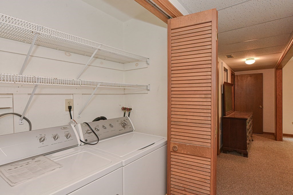 17 Nottingham Road, Unit 17 Grafton, MA 01519 - Photo 23 of 23 a bathroom with a sink and a mirror
