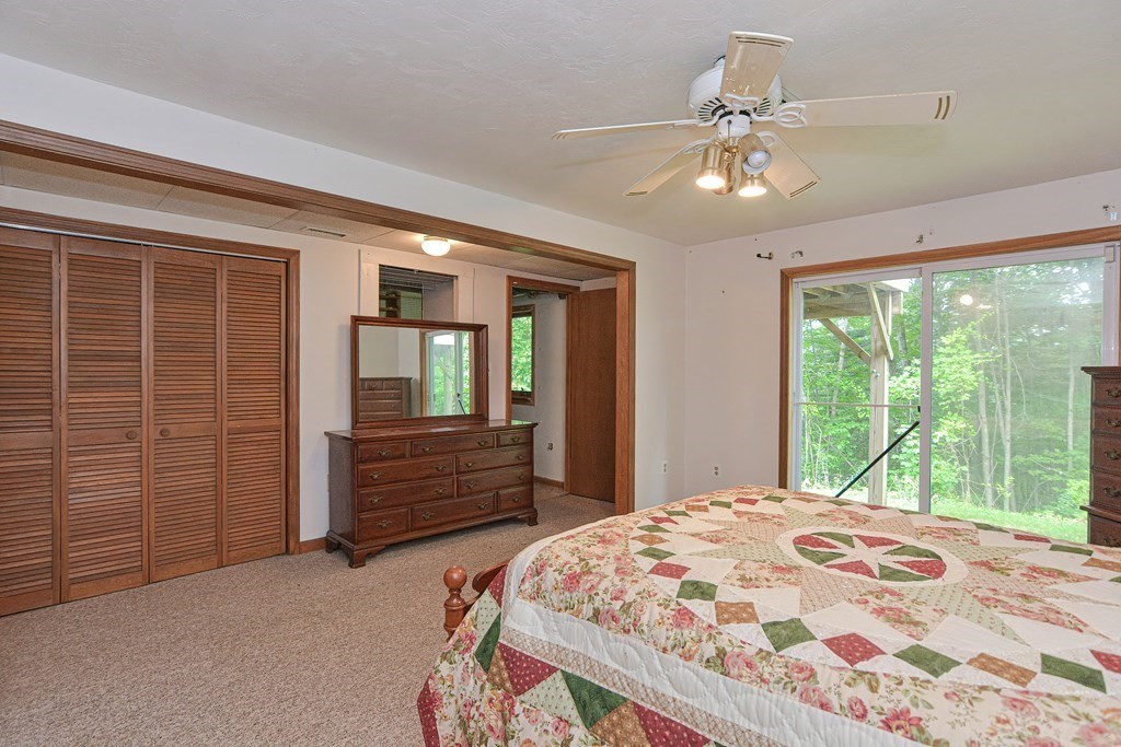 17 Nottingham Road, Unit 17 Grafton, MA 01519 - Photo 10 of 23 a bedroom with a bed and a large window