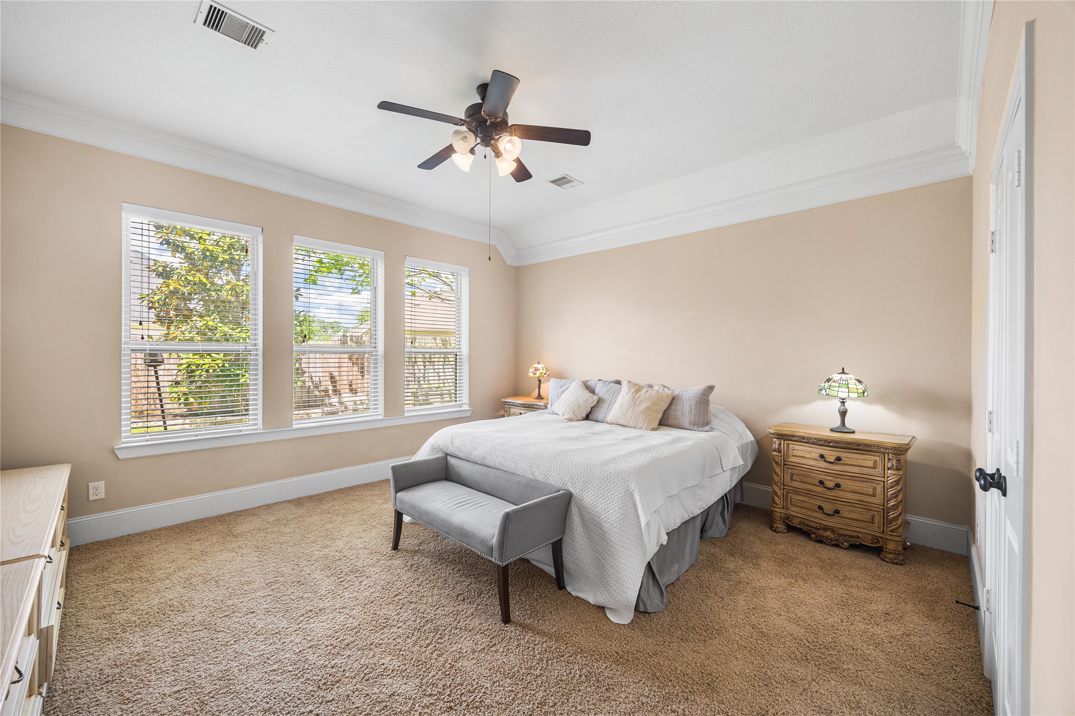 31311 Brighton Brook Lane Spring, TX 77386 - Photo 20 of 47 Spacious primary suite with peaceful backyard views.