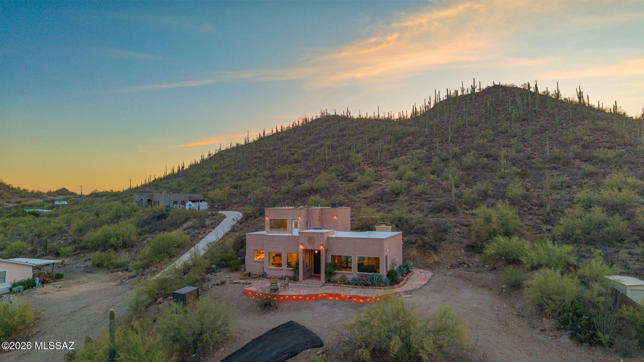 4210 West Mossman Road Tucson, AZ 85746 - Photo 45 of 51 a view of houses with outdoor space and garden