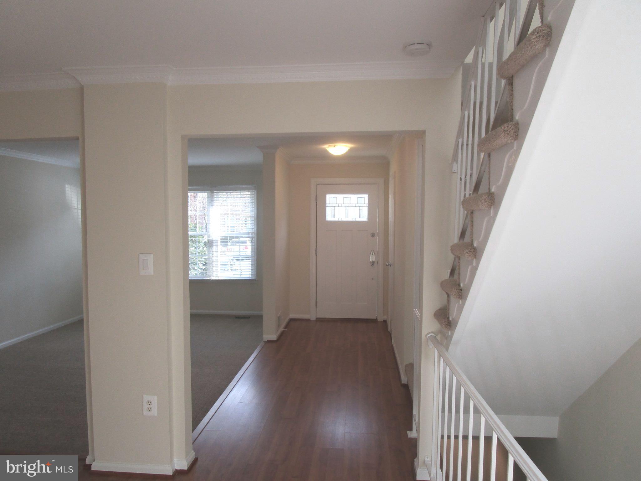 7932 Forest Path Way Springfield, VA 22153 - Photo 2 of 30 Foyer w/Step Down Living Roon